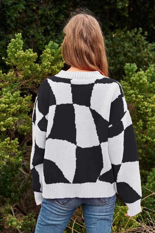 
                  
                    Suéter de punto con cuello de pullover Multi Geo Checker
                  
                