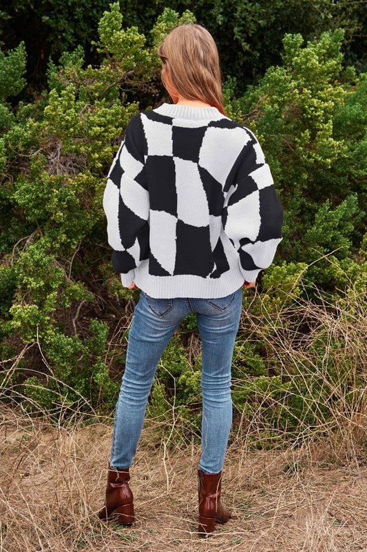 
                  
                    Suéter de punto con cuello de pullover Multi Geo Checker
                  
                