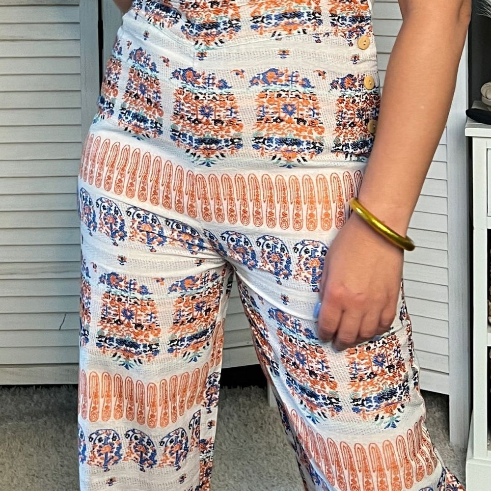 
                  
                    Orange Sunset Jumpsuit
                  
                